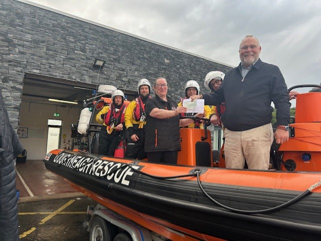 Gerry Darby, Manager of Lough Neagh Partnership, aboard a Lough Neagh Rescue boat.